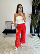 Pantalon plissé orange DS.Sélection